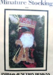 228 MINIATURE FURRY SANTA STOCKING,XMAS BOWS PATTERN